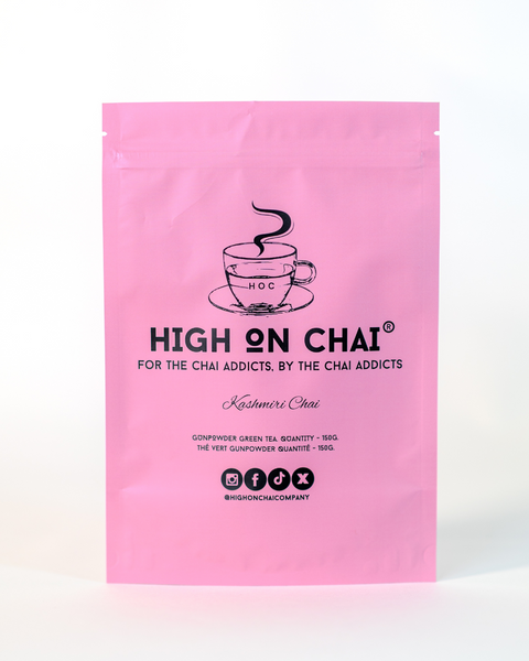 Pink packaging of High on Chai with a cup illustration on a white background